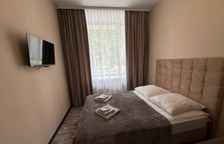 Одноместный улучшенный стандарт без балкона с односпальной кроватью